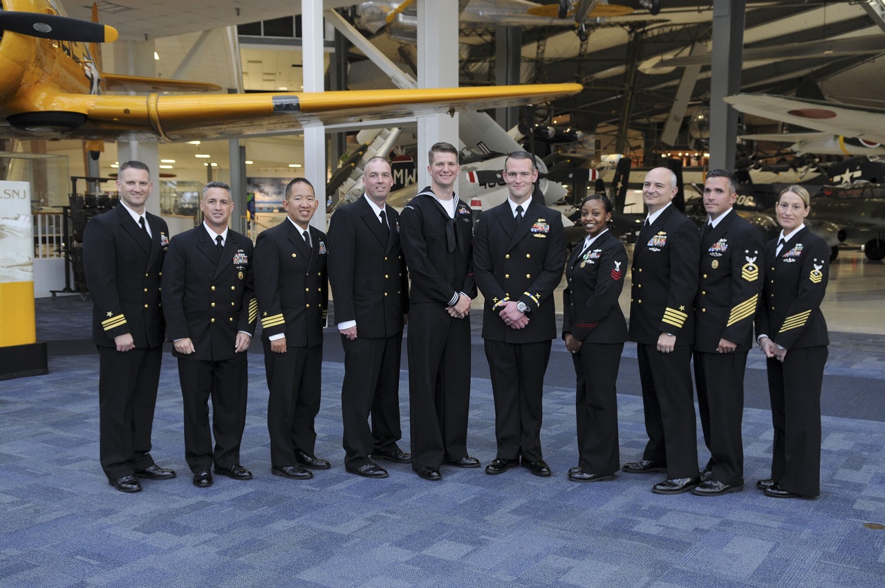 PENSACOLA, Fla. (Dec. 15, 2016) Center for Information Warfare Training Command (CIWT) finalists for Naval Education and Training Command's Sailor of the Year and Instructor of the Year awards pose for a group photo with CIWT leadership. CIWT's finalists included Petty Officer 1st Class Kayshonda London (fourth from right) of CIWT Detachment Fort Gordon, Georgia for Sailor of the Year and Chief Warrant Officer 3 Dane Beichter (fifth from right) of Information Warfare Training Command (IWTC) Virginia Beach for Officer Instructor of the Year. Petty Officer 1st Class Scott Searcy (fifth from left) of IWTC Corry Station was selected as mid-grade Instructor of the Year. U.S. Navy photo by Carla M. McCarthy/Released 