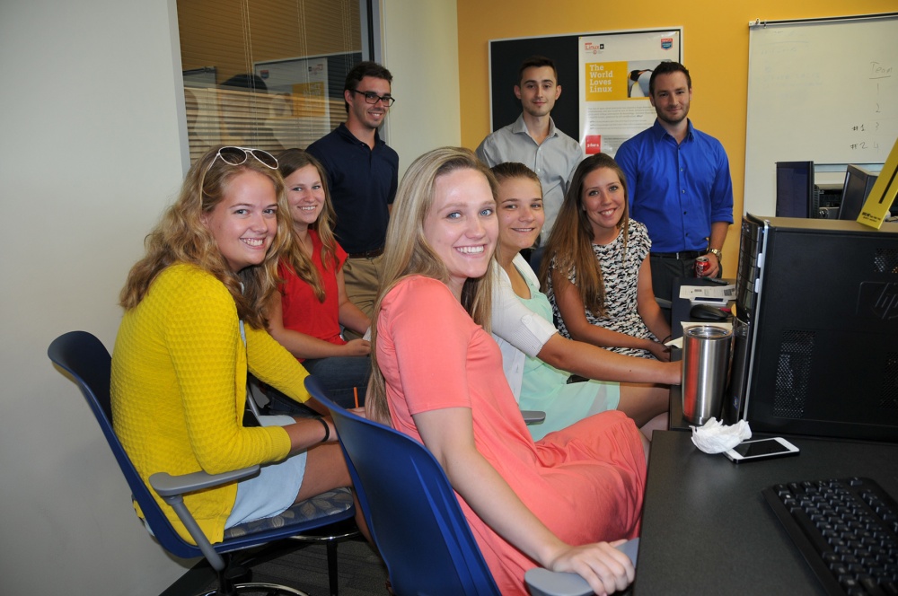 A group of Naval Research Enterprise Internship Program (NREIP) interns pose for a photo while participating during the Capture the Flag event at Gulf Coast State College on July 15, 2016. Pictured from left to right: Melanie MacBain, Lizzy Shoner, Daniel Findeis, Britney Doll, Melissa Pumphrey, Trevor Phillips, Lauren Rothman and Daniel Jermyn. U.S. Navy Photo by Katherine Mapp/Released