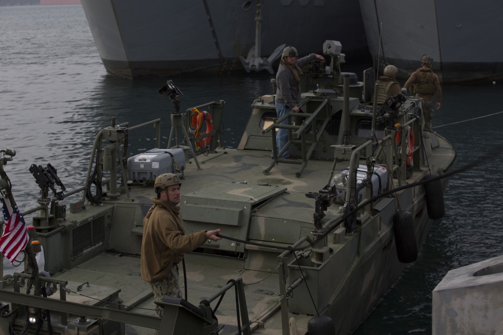 BUSAN, Republic of Korea: U.S. Navy Sailors with the Riverine Command Boat (RCB) Detachment, Coastal Riverine Squadron 3, detach the RCB from the dock after being lifted into the waters of Pier 9, Pohang Port, South Korea, during Exercise Ssang Yong 16.  U.S. Marine Corps photo by MCIPAC Combat Camera Cpl. Allison Lotz 
