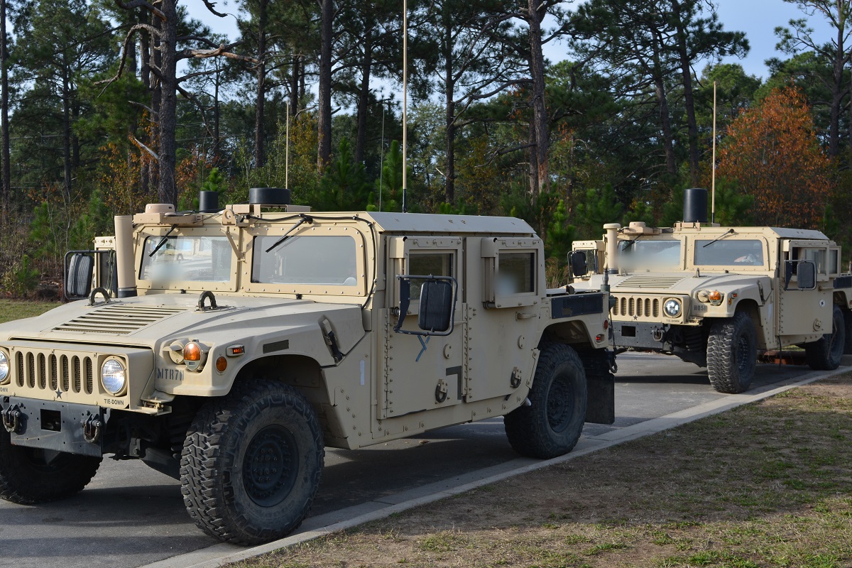 A new prototype low-profile Vehicle on the Move (VOTM) antenna (front vehicle), which is about one fourth the height of the 'top hat' VOTM antenna (back vehicle) was tested during a Customer Test (CT) at Ft. Bragg, N.C. on 16-20 November, 2015. The CT evaluated the Manpack Radio in both mounted and dismounted configurations in various terrains with the Mobile User Objective System (MUOS) waveform.  U.S. Army photo by Argie Sarantinos-Perrin, PEO C3T PM TR 