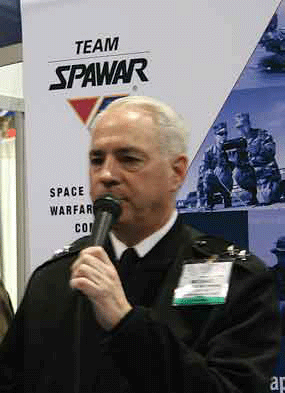 SPAWAR Commander Rear Adm. Michael C. Bachmann speaking at the SPAWAR exhibit. Photo by Holly Quick/SPAWARSYSCEN Atlantic.