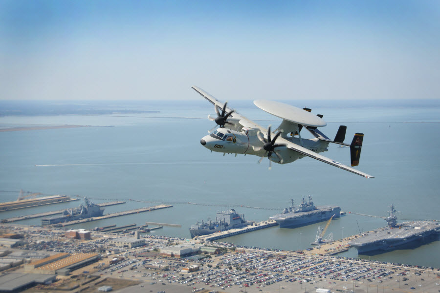 NORFOLK (March 20, 2014) An E-2D Hawkeye assigned to the Tigertails of Carrier Airborne Early Warning Squadron (VAW) 125 flies over Naval Station Norfolk. VAW-125 provides airborne early warning and command and control to Carrier Air Wing 1 and is assigned aboard the aircraft carrier USS Theodore Roosevelt (CVN 71). U.S. Navy photo by Mass Communication Specialist 2nd Class Ernest R. Scott. 