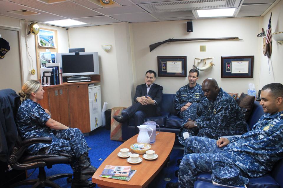 San Diego, Calif. (August 6th, 2013) – Cmdr. Nicole Shue, USS Higgins Commanding  Officer, visits with Rear Adm. Christian Becker, the Program Executive Officer for Command, Control, Communications, Computers, and Intelligence and  Dr. John Zangardi, Deputy Assistant Secretary of the Navy for Command, Control, Communications, Computers, Intelligence, Information Operations, and Space while they visited  USS Higgins (DDG 76) for a tour of the ship’s recent Consolidated Afloat Networks and Enterprise Services (CANES) installation. Higgins, home ported in San Diego, is currently in the Basic Phase of training in preparation for future deployments. U.S. Navy photo by Lt. j.g. Kara Lynn Yingling.