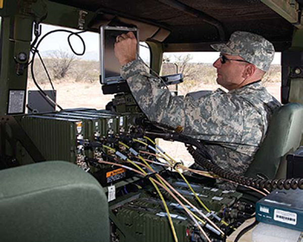 The Joint Interoperability Test Command (JITC) testing of the Ground Mobile Radio (GMR) at Fort Huachuca. The GMR is designed for vehicles and is an integral part of the Army Future Combat System for networking. All JTRS-approved radios must be JITC-tested for interoperability with legacy radios, as well as new wave forms. They must also meet National Security Agency security standards. Photo courtesy of Boeing Corp.