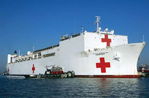 NORFOLK, Va. – Oct. 15, 2007 – Sailors man the rails as Military Sealift Command hospital ship USNS Comfort (T-AH 20) pulls pierside into Norfolk Naval Station. Comfort is wrapping up a four-month humanitarian deployment to Latin America and the Caribbean providing medical treatment in 12 countries. U.S. Navy photo by Mass Communication Specialist 2nd Class Lolita M. Lewis.