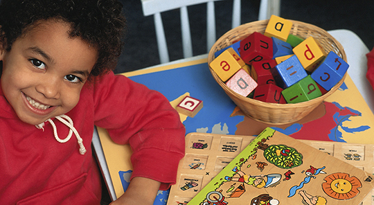 toddler and toy blocks