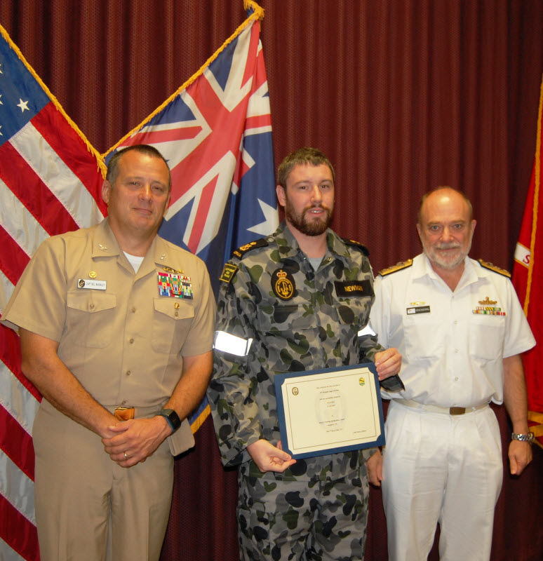 DAHLGREN, Va. (July 03, 2014) Left to right: Center for Surface Combat Systems Commanding Officer Capt. Bill McKinley, Royal Australian Navy (RAN) Petty Officer Nicholas Newman, and Naval Attaché to the United States for RAN Commodore Steve McDowall pose for a photo during the Fire Control System Operators (FCS)/ Hobart Class Air Warfare Destroyer (AWD) RAN graduation at the Center for Surface Combat Systems (CSCS), onboard Naval Support Facility Dahlgren.  U.S. Navy photo by Joe Garry, CSCS International Programs. 