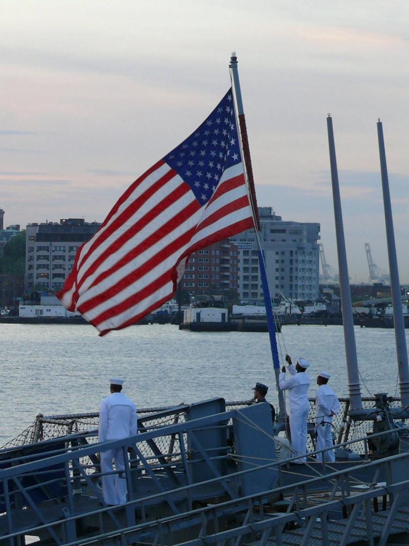 NEW YORK (May 26, 2014) Sailors aboard the guided-missile destroyer USS McFaul (DDG 74)retire the colors in Staten Island during Fleet Week New York 2014. Now in its 26th year, Fleet Week New York is the city's time-honored celebration of the sea services. The weeklong celebration is an opportunity for the citizens of New York and the surrounding tri-state area to meet Sailors, Marines, and Coast Guardsmen, as well as witness firsthand the latest capabilities of today's maritime services. U.S. Navy photo by Cmdr. Daryl Borgquist.