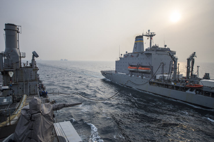 The amphibious transport dock ship USS Denver (LPD 9) conducts a replenishment-at-sea with the Military Sealift Command fleet replenishment oiler USNS Rappahannock (T-AO 204) in the East China Sea, April 3, 2014. U.S. Navy photo by Mass Communication Specialist 3rd Class Todd C. Behrman.