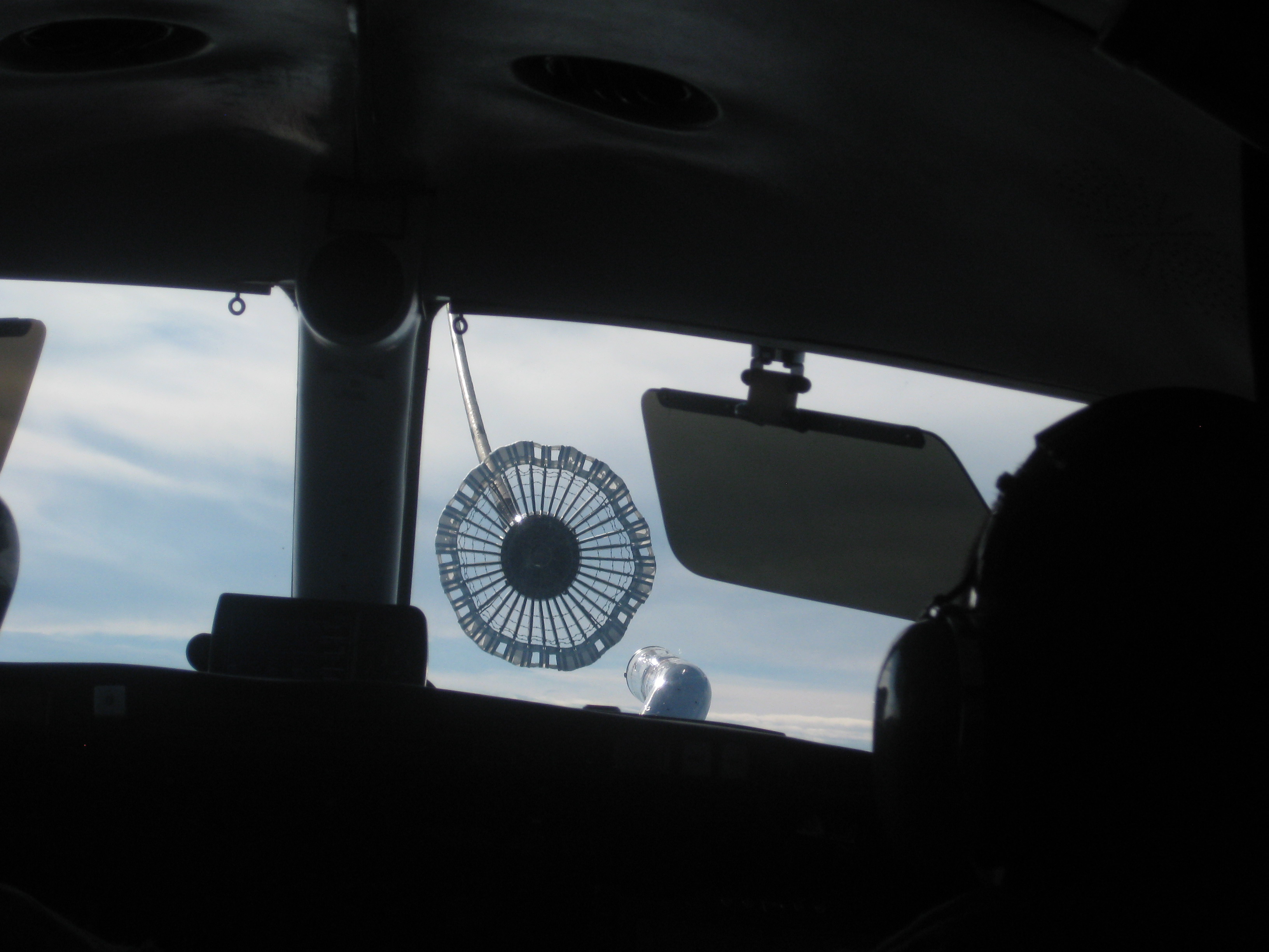 From the pilot‘s perspective, the Calspan Learjet inert probe approaches an Omega Tanker drogue during a UCAS-D program Autonomous Aerial Refueling test. The Learjet flies as a surrogate autonomous aircraft and is outfitted with the X-47B‘s navigation, command and control, and vision processor hardware and software to assess autonomous aerial refueling functionality and performance for both Navy and Air Force style refueling techniques. The AAR testing allows the Navy to demonstrate multiple technologies that are expected to significantly increase the endurance and range of carrier-based unmanned aircraft. (Photo courtesy of Northrop Grumman)