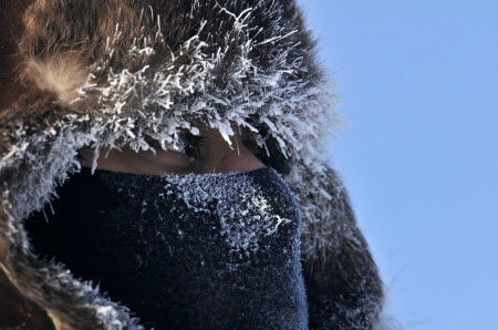 Sonar Technician (Submarine) 1st Class Jose Gutierrez, assistant range safety officer, watches daily operations while maintaining communication with the command hut at the Applied Physics Lab Ice Station in the during Ice Exercise 2009. U.S. Navy photo.