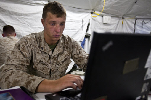 Lance Cpl. Jarred Burnett, 22nd Marine Expeditionary Unit intelligence analyst and native of Levittown, Penn., creates an intelligence brief during the 22nd Marine Expeditionary Unit’s interoperability exercise at Marine Corps Base Camp Lejeune, N.C., June 12, 2013. Approximately 30 intelligence Marines from the MEU’s command and support element intelligence sections trained to efficiently mesh together in the fast-paced MEU setting for the unit’s upcoming deployment. Marine Corps photo by Sgt. Austin Hazard. 