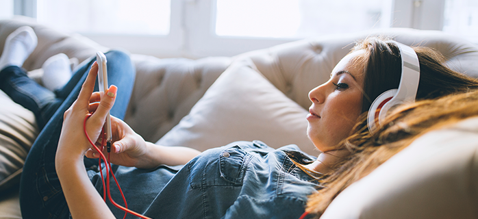 woman listening to podcast