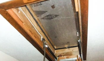 Sealing gaps in the opening and installing an insulating cover box on your attic stairs access can improve comfort and save energy and money. | Photo courtesy of U.S. Department of Energy's Weatherization Assistance Program.