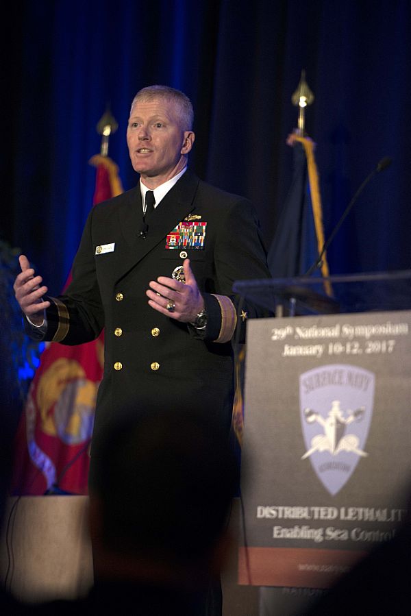 ARLINGTON, Va. (Jan. 10, 2017) Rear Adm. John Wade, commander, Naval Surface and Mine Warfighting Development Center (SMWDC), delivers remarks during the 29th annual Surface Navy Association (SNA) National Symposium on the status of SMWDC's warfare tactics instructor (WTI) program. Wade highlighted the 125 WTIs across the fleet specializing in amphibious warfare, anti-submarine/anti-surface warfare and integrated air and missile defense. SMWDC biannually selects an elite cadre of tactically advanced junior Surface Warfare Officers to become WTIs - the best of the best in doctrine and tactics. This year's SNA Symposium focuses on "Distributed Lethality: Enabling Sea Control." U.S. Navy photo by Mass Communication Specialist 2nd Class Ignacio Perez.