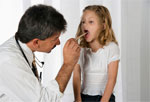 	Doctor examining girls throat