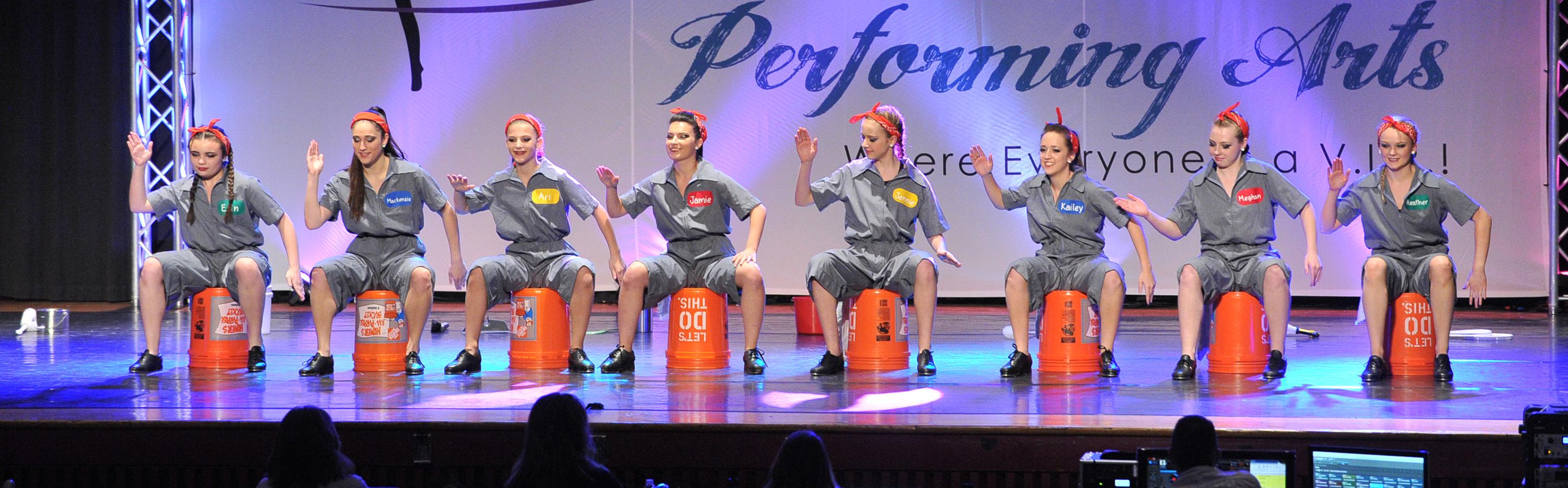 Tap dancers performing with Homer Buckets