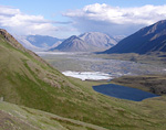 Lake and creek in mountains