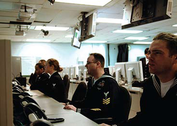 NORFOLK, Va. (Feb. 28, 2008) Electronics Technician 1st Class David McInnis assigned to Commander, Strike Force Training Atlantic, participates in a small-scale demonstration of the Distributed Training Center Atlantic at its grand opening on board Naval Air Station Oceana, Dam Neck Annex. U.S. Navy photo by Mass Communication Specialist Seaman Apprentice Tyler J. Wilson.