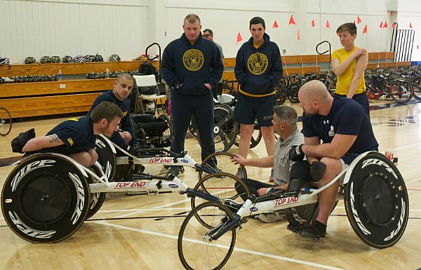 NAVAL BASE VENTURA COUNTY, Calif. (Jan. 17, 2016) Navy Wounded Warriors learn how to cycle safely during their track training session at the adaptive athletics camp on Naval Base Ventura County. U.S. Navy photo by Shannon Leonard.