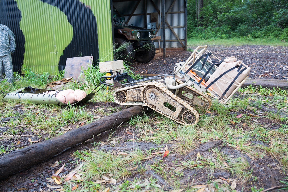 25th Infantry Division Soldiers and U.S. Army Research, Development and Engineering Command representatives test the battlefield capabilities of a robot at an East Range Training facility in Hawaii. Photo by Staff Sgt. Tramel S Garrett (25th ID)