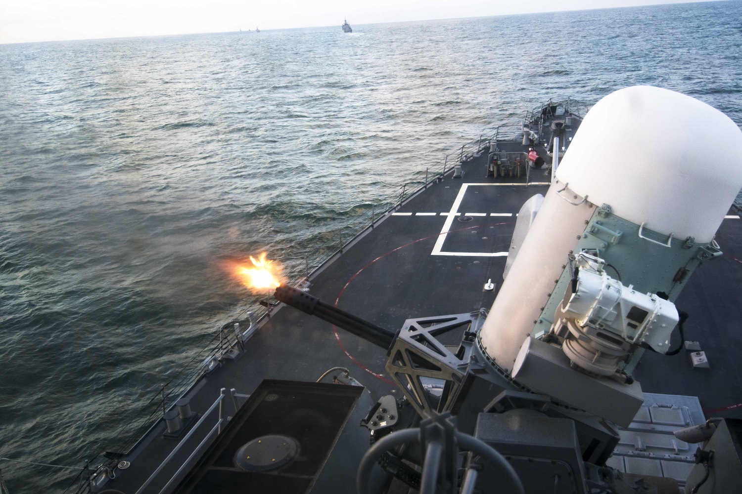 The guided-missile destroyer USS Porter (DDG 78) fires its close-in weapons system during a live-fire exercise as part of a passing exercise with allied and partner nations Bulgaria, Romania, Turkey and Ukraine in the Black Sea. Porter is on a routine patrol conducting naval operations in the U.S. 6th Fleet area of operations in support of U.S. national security interests in Europe. U.S. Navy photo by Mass Communication Specialist 1st Class Sean Spratt  