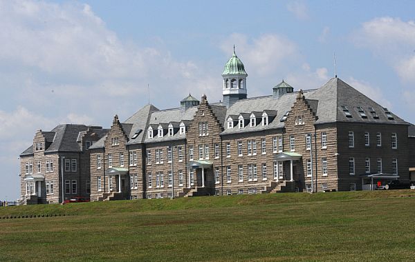 NEWPORT, R.I. (July 30, 2015) U.S. Naval War College's (NWC) Luce Hall located at Naval Station Newport in Newport, Rhode Island. Named after NWC's first president, Rear Adm. Stephen B. Luce, Luce Hall was built in 1892 and is a national historic landmark. Luce founded NWC's study of strategy, tactics, and operations based on a core of history. His lectures, readings, and seminars transformed from a month-long course to an intensive one-year professional naval study. Luce Hall now houses NWC's Naval Command College and College of International Programs. U.S. Navy photo by Haley Nace.