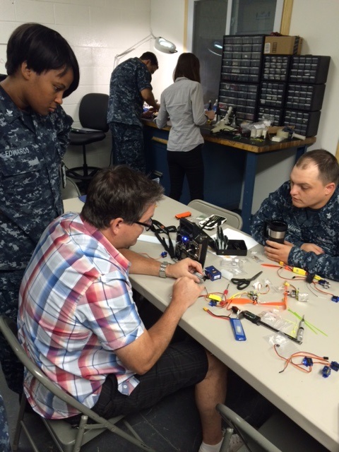 A Fabrication Lab (Fab Lab) consists of a suite of digital fabrication and rapid prototyping machines, which typically include a high resolution CNC milling machine, laser cutter, wood router, 3D (desktop) printer, as well as, the accompanying computers, software and electronics necessary for design, programming and machine communications.
U.S. Navy photo