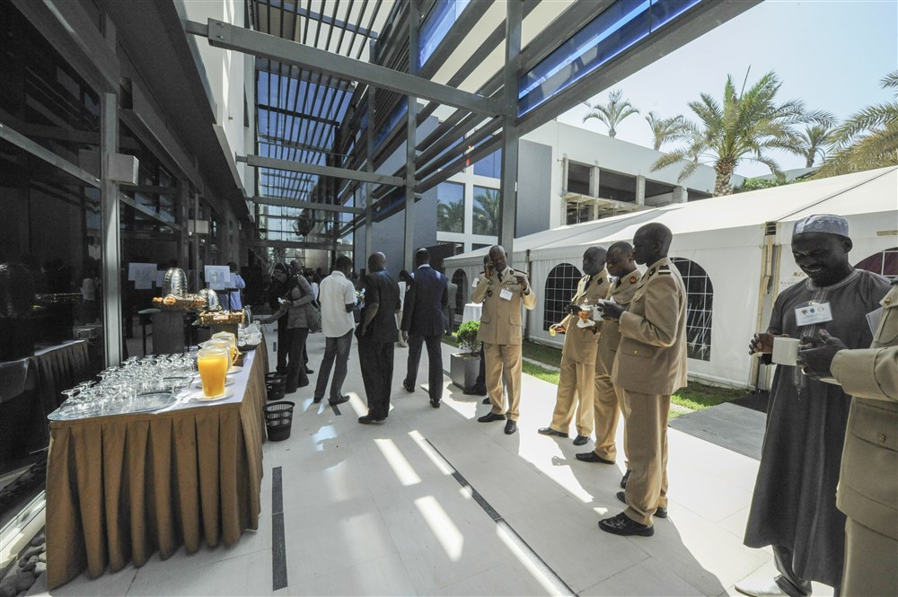 Guests enjoy refreshments during a break at the Republic of Senegal Disaster Preparedness and Response Exercise in Dakar, Senegal, 2 June. The event represented a successful collaboration among international and interagency organizations, with the Government of Senegal hosting an event sponsored by U.S. Africa Command and executed by the Center for Disaster and Humanitarian Assistance Medicine. (U.S. Africa Command photo by Petty Officer First Class D. Keith Simmons)