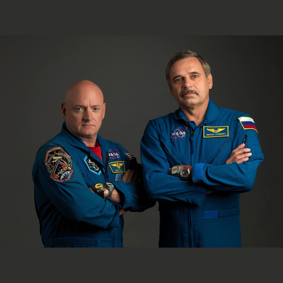 NASA astronaut Scott Kelly (left), Expedition 43/44 flight engineer and Expedition 45/46 commander; and Russian cosmonaut Mikhail Kornienko, Expedition 43-46 flight engineer, take a break from training at NASA's Johnson Space Center to pose for a portrait. Image Credit: NASA/Bill Stafford