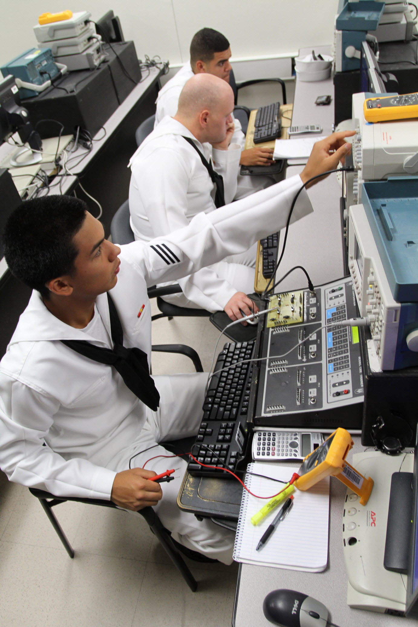 PENSACOLA, Fla. (Oct. 18, 2012) Seaman Jesus Torres adjusts test equipment during a lab session in the Cryptology Technician (Maintenance) course at Naval Air Technical Training Center at Naval Air Station Pensacola. The U.S. Navy is reliable, flexible, and ready to respond worldwide on, above, and below the sea. Join the conversation on social media using #warfighting. U.S. Navy photo by Joy Samsel.