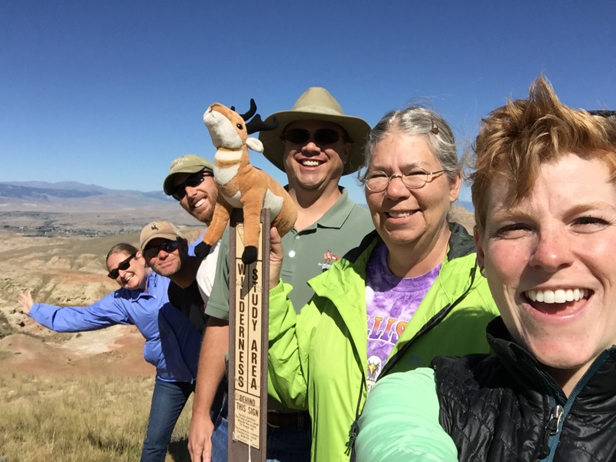 BLM volunteers celebrate their accomplishments after cleaning up public lands, BLM photo