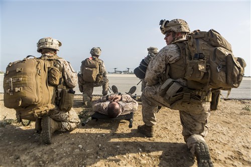 Marines with Special-Purpose Marine Air-Ground Task Force Crisis Response-Africa extract a simulated downed pilot during a tactical recovery of aircraft and personnel exercise aboard Naval Station Rota, Spain, August 3. The training allowed Marines to test their ability to rapidly launch and recover a simulated downed pilot. (U.S. Marine Corps photo by Staff Sgt. Vitaliy Rusavskiy/Released)