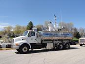 Pendills Creek NFH fish distribution truck at the dock with the M/V Spencer F. Baird