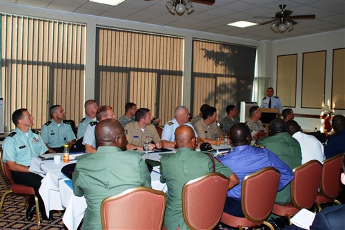 STUTTGART, Germany - Participants of a Theater Security Cooperation planning meeting listen to Lieutenant Colonel Hap Harlow, deputy division chief for West and Central Africa, as he provides an overview on U.S. Africa Command, September 10, 2009 at Patch Barracks in Stuttgart, Germany. A delegation of six Nigerian senior flag officers responsible for military training, along with Country Team members from the U.S. Embassy in Abuja, traveled to Stuttgart to assist in planning the agenda for U.S.-Nigerian cooperation events for fiscal year 2010-2012. (Photo by Danielle Skinner, U.S. Africa Command)