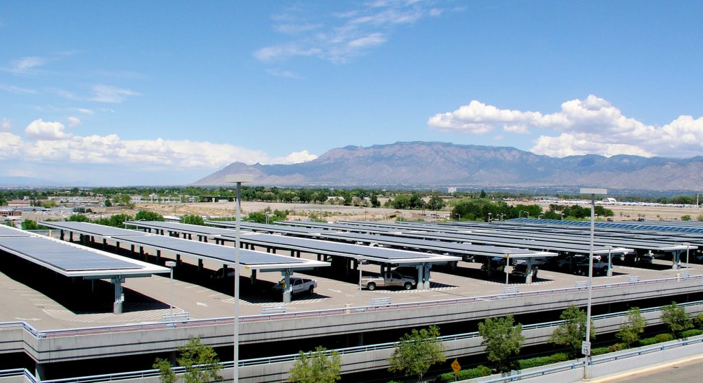 Solar panels on parking canopies (© AP Images)