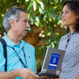 A resident of Honolulu, Hawaii answers questions from the American Community Survey with a Census Bureau enumerator. All survey images are simulated.