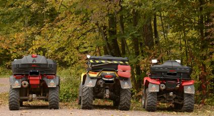 A photo of a team of ATVer’s dismounted their rides for a hike in the Morgan Falls scenic area.