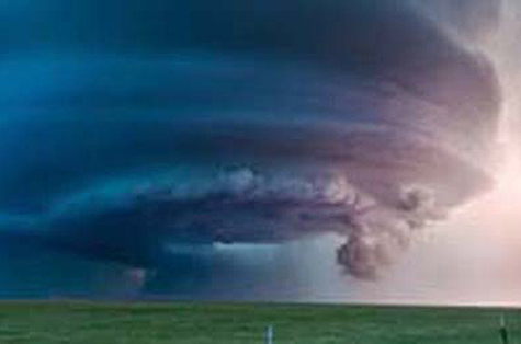 tornado forming in a field