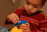 Young Boy Playing With Blocks