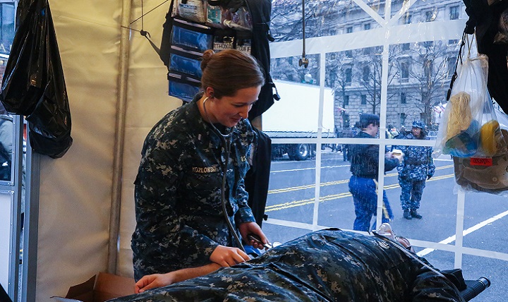 Navy Lt. j.g. Kimberly Kozlowski, assigned to the Walter Reed National Military Medical Center in Bethesda, Maryland, performs a blood pressure demonstration after the Inauguration of Donald J. Trump as the 45th President of the United States in Washington, D.C. More than 5,000 military members from across all branches of the armed forces of the United States, including Reserve and National Guard components, provided ceremonial support and Defense Support of Civil Authorities during the inaugural period. (DoD photo by Army Pvt. Genesis Gomez)