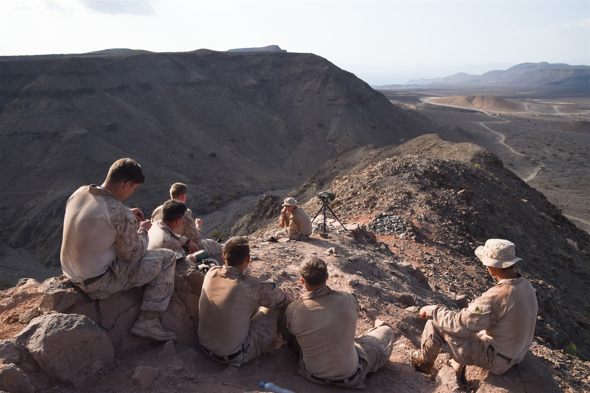 U.S. Marine Corps members with 1st Air Naval Gunfire Liaison Company (ANGLICO), 11th Marine Expeditionary Unit (MEU), wait to communicate with players during a helo-borne raid on the range during Exercise Alligator Dagger, Dec. 18, 2016, at Arta Plage, Djibouti. The exercise allows opportunities for the 11th MEU to maintain their respective skills and proficiencies while intermittently participating in bilateral training with the French. (U.S. Air National Guard photo by Staff Sgt. Penny Snoozy)