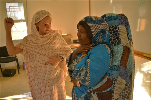 Sgt. Sarah DeArcy, a civil affairs team medic with C/Co 411th Civil Affairs Battalion, coaches SOS Village d’ Enfants inTadjoura  caretakers on how to perform the abdominal thrust technique during a first aid discussion group on Jan. 3, 2017. The discussion group covered various medical topics and gave Djiboutians the opportunity to receive hands on training. 

(US Army Photo By: Staff Sgt. Gregory Williams C Co/411th Civil Affairs Battalion/Released)