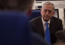 Jim Mattis, seated (Defense Dept.)