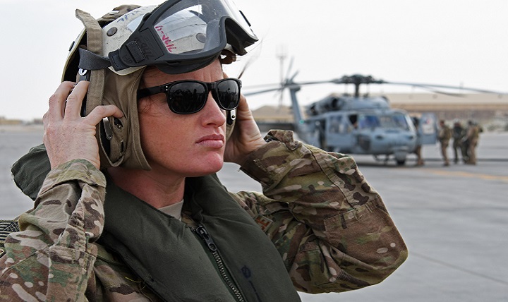 Air Force 1st Lt. Bridget Henry, a critical care nurse with the 379th Expeditionary Medical Group, dons a helmet during a flight safety briefing. Henry was part of a mobile forward surgical team - expeditionary critical care team taking part in an exercise onboard the Royal Navy’s flagship, HMS Ocean. (U.S. Air Force photo by Senior Airman Miles Wilson)