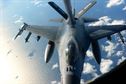 An F-16 Fighting Falcon receives fuel from a KC-135R Stratotanker during exercise Razor Talon Dec. 14, 2015, over the coast of North Carolina. The aircrew and other support units from multiple bases conducted training missions designed to bolster cohesion between forces. (U.S. Air Force photo/Senior Airman John Nieves Camacho)