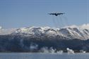 An HC-130 Hercules from the 211th Rescue Squadron drops signal flares in the inner bay of Homer, Alaska, as part of rescue water training Sept. 30, 2015. The 210th, 211th and 212th Rescue Squadrons of the Alaska Air Guard’s 176th Wing trained on water rescue tactics Sept. 30 to Oct. 1. The wing’s &quot;rescue triad&quot; performed both day and night missions including personnel jumps and cargo drops on a moving target, flying night water operations, visual search for casualties and drop zone control for safety and situation management. (U.S. Air National Guard photo/Tech. Sgt. N. Alicia Halla)