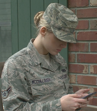 A United States Airman uses the T2 Mood Tracker app on her mobile device. Photo by T2 PAO.