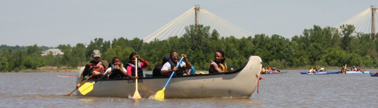 Canoeing on a river in an urban national park.