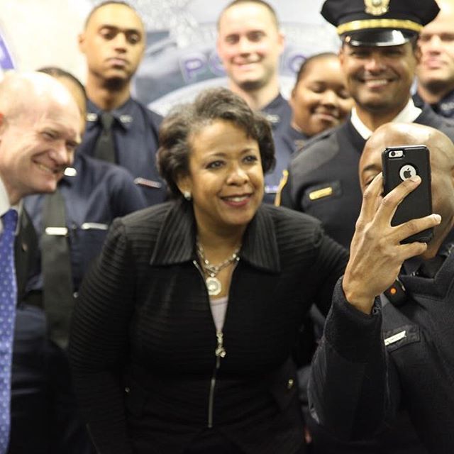 Delaware's Wilmington Police Department greets Attorney General Loretta E. Lynch and Senator Chris Coons.  Photo courtesy of Senator Coons' office.